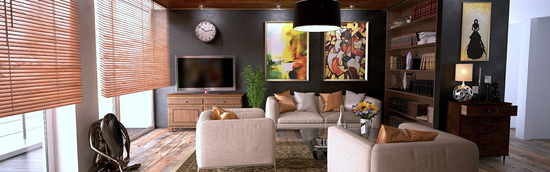 Moderner Wohnraum mit Couch und Loungesessel neben einer Fensterfront